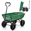 A green garden cart with black wheels and handle, shown from a slightly low angle. A smaller inset image shows the same cart tilted, with its contents spilling out. Podgląd zdjęcia produktu