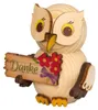 Eine niedliche Holzeule hält ein Schild mit der Aufschrift Danke und einem Blumenmotiv in ihren Flügeln Productafbeelding-voorbeeld