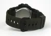 The back of a green digital watch with a black buckle is shown against a white background. Podgląd zdjęcia produktu