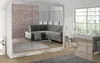 A modern living room with a large mirrored wardrobe reflecting a sectional sofa and a brick wall. Náhled obrázku produktu