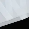 A close-up view of white sheer fabric, likely curtains or a similar textile, layered and folded against a black background. Produktbild-Vorschau