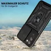 A black phone case with a ring holder is shown in a snowy, outdoor environment. Produktbild-Vorschau