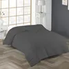 A dark gray duvet is laid out on a bed in a bedroom setting, with a window and a bedside table visible. Produktbild-Vorschau