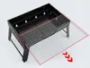 A black foldable charcoal grill with a silver grill grate extended outwards, shown on a white background. Náhled obrázku produktu