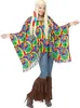 A woman wearing a colorful tie-dye poncho and jeans, posing against a white background. Produktbild-Vorschau