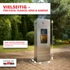 A stainless steel smoker oven with fish inside, placed on a paved patio with trees and bushes in the background. Produktbild-Vorschau