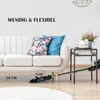 A vacuum cleaner is shown under a sofa, demonstrating its low profile capability. Produktbild-Vorschau