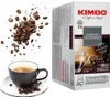A box of Kimbo Espresso Intenso coffee capsules next to a cup of coffee and scattered coffee beans. Voir les images du produit