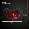 A red devil mask with black horns is displayed against a dark background, with dimensions indicated. Produktbild-Vorschau