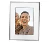 A silver picture frame with a white mat, displaying a photo of two people. Produktbild-Vorschau
