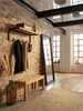 Draufsicht auf die Flurgarderobe mit Hakenleiste und Ablage. Die Komposition zeigt die 30 cm tiefe Holzablage und die Anordnung der Haken im Raumkontext._#sku_SAFWL6.354# Produktbild-Vorschau
