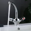 A chrome faucet with water running into a white sink. Produktbild-Vorschau
