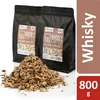 Two bags of whisky smoker chips are shown with a pile of chips in the foreground, and text overlays on the right side. Náhled obrázku produktu