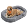 A golden retriever dog lying on a gray dog bed. Náhled obrázku produktu