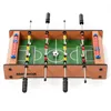 A tabletop foosball game with a soccer ball in the center. Podgląd zdjęcia produktu