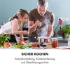 A father and daughter are cooking together in a kitchen, with a pot steaming on the stove. Produktbild-Vorschau
