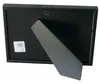 The back of a black picture frame with a stand. Produktbild-Vorschau