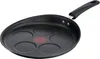 A black pancake pan with five circular indentations and a red heat indicator in the center, set against a white background. Voir les images du produit