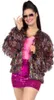 A woman wearing a sparkly jacket and skirt. Produktbild-Vorschau