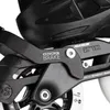 A close-up view of the brake mechanism and wheels of a black inline skate. Produktbild-Vorschau