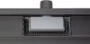 A close-up view of a shower drain with a gray insert and a black grate. Podgląd zdjęcia produktu