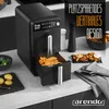 A black Arendo air fryer is shown on a kitchen counter, with food and ingredients around it. Produktbild-Vorschau