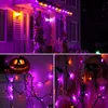 Collage of Halloween decorations including a house facade with purple lights, a carved pumpkin, and a skull decoration. Produktbild-Vorschau