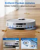 A white robot vacuum cleaner is shown on a wooden floor with simulated dirt stains, demonstrating its cleaning capabilities. There are also inset images showing specific features. Anteprima dell’immagine prodotto