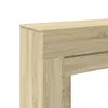 A close-up view of the corner of a wooden mantelpiece. Voir les images du produit