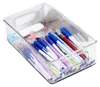 A clear plastic organizer bin filled with pens and other stationery items. Náhled obrázku produktu