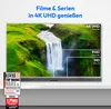 A television displaying a waterfall scene with resolution comparisons. Produktbild-Vorschau