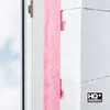 A close-up view of building materials, showing insulation and construction blocks. Produktbild-Vorschau