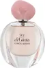 A perfume bottle with a pink cap. Podgląd zdjęcia produktu
