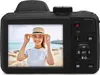 The back of a black digital camera displaying a photo of a smiling woman on its screen. Náhled obrázku produktu