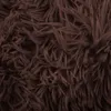 A close-up view of a brown, fluffy material, likely a pet bed. Produktbild-Vorschau