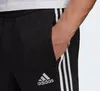 Adidas Pantaloni Essentials Tapered Cuff 3 Stripes, GK8831, Anteprima dell’immagine prodotto 17