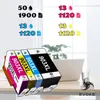 Ink cartridges displayed on a desk with a laptop in the background. Náhled obrázku produktu