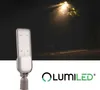 A product shot of an LED street lamp in the foreground, with a background image of a street lamp at night. Náhľad obrázku produktu