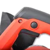 A close-up view of the handle and trigger mechanism of an orange and black power tool, likely a planer. Produktbild-Vorschau