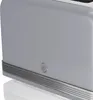 Close-up of the bottom corner of a toaster, showing the brand logo and decorative trim. Produktbild-Vorschau