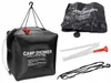 A black camp shower bag with accessories laid out next to it on a white background. Anteprima dell’immagine prodotto