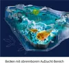 A diorama of a prehistoric aquatic environment with triops (prehistoric crustaceans) and footprints, enclosed in clear plastic. Produktbild-Vorschau
