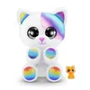 A white plush cat toy with rainbow accents and a small orange cat figurine. Podgląd zdjęcia produktu