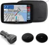 A TomTom GPS navigation device with its accessories, including a car charger and mounting discs, presented on a white background. Produktbild-Vorschau