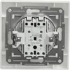 The back of a white electrical switch with visible wiring terminals and mounting bracket. Anteprima dell’immagine prodotto