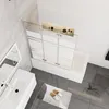 A modern bathroom with a bathtub and shower screen. Produktbild-Vorschau