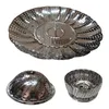 A set of stainless steel steamer baskets for cooking. Produktbild-Vorschau
