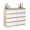 A dresser with decorative items on top against a white background. Produktbild-Vorschau