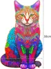 A colorful, intricately designed wooden puzzle in the shape of a sitting cat. Náhľad obrázku produktu