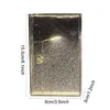 A product shot of a decorative light with glitter and a miniature street lamp inside. Produktbild-Vorschau